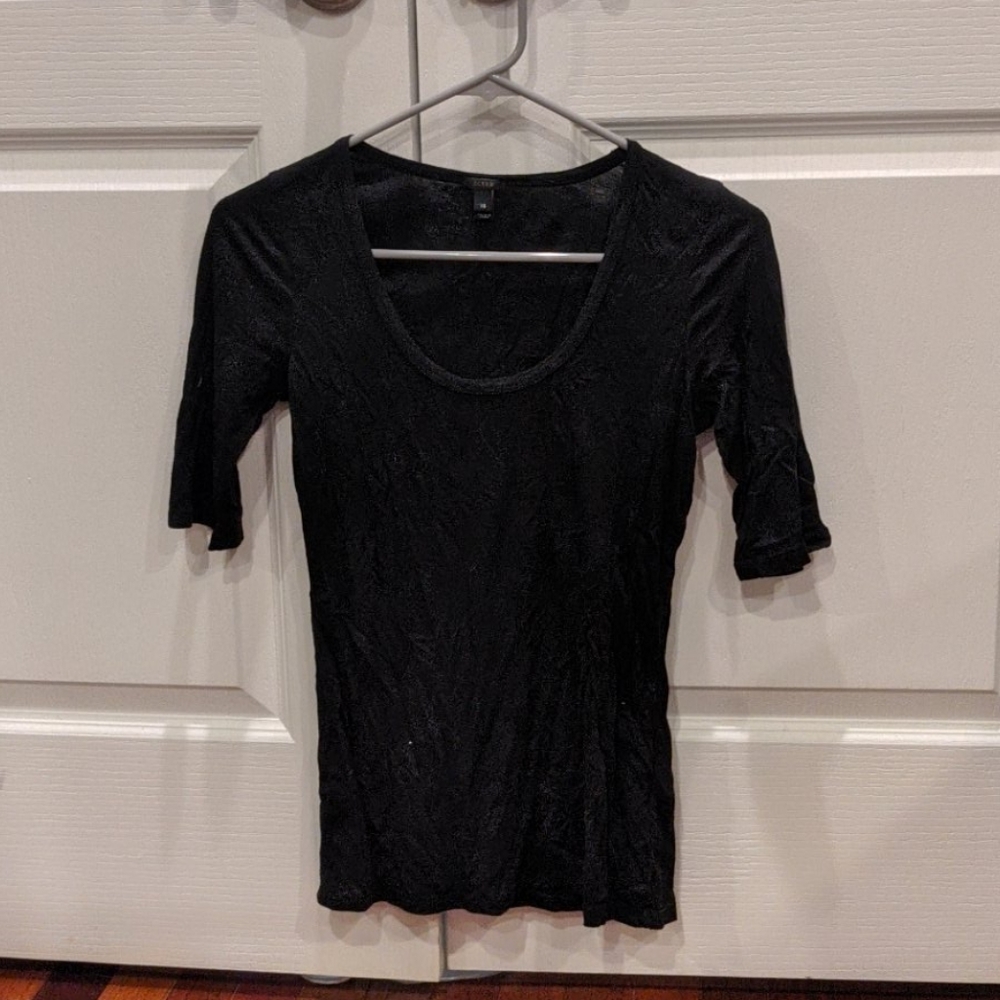 Soft black scoop neckline half length sleeves